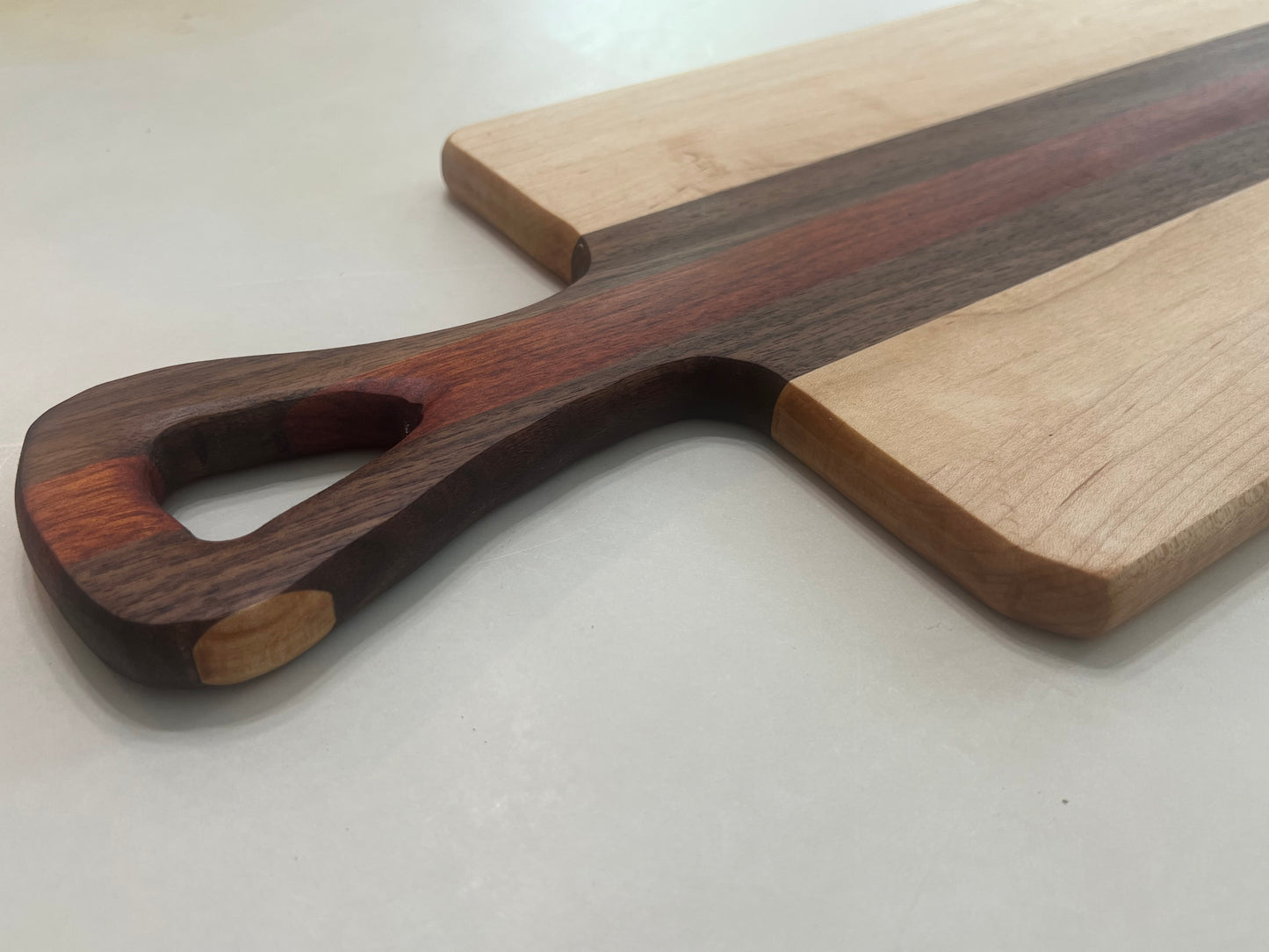 Hand crafted hardwood Charcuterie board - Made from maple, walnut, and blood wood.